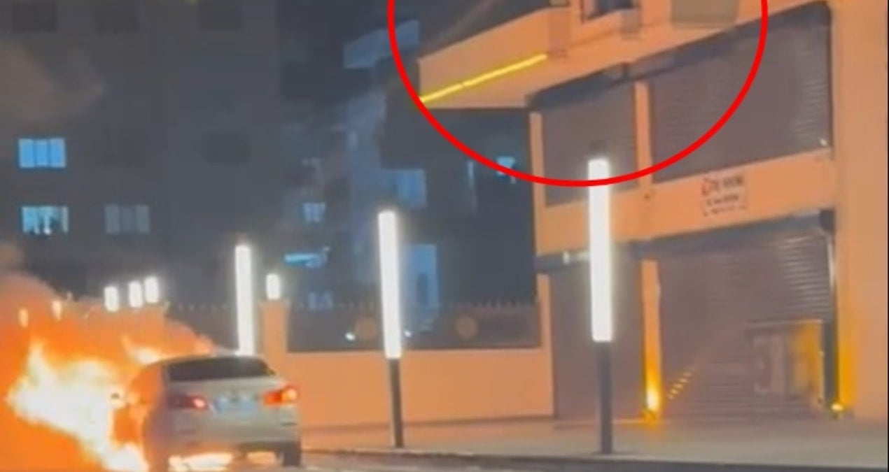 Alev alan otomobile, balkondan müdahale